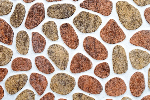 texture of colored stones on a white background