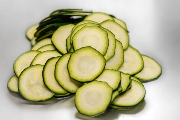 Courgette Zucchini Sliced Very Thin Rounds Selective Focus — стоковое фото