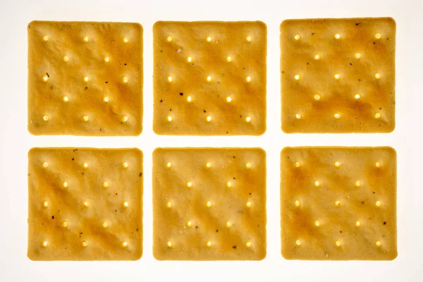 Craker Quadrado Isolado Branco Seis Biscoitos Dispostos Geometricamente Vista Superior — Fotografia de Stock
