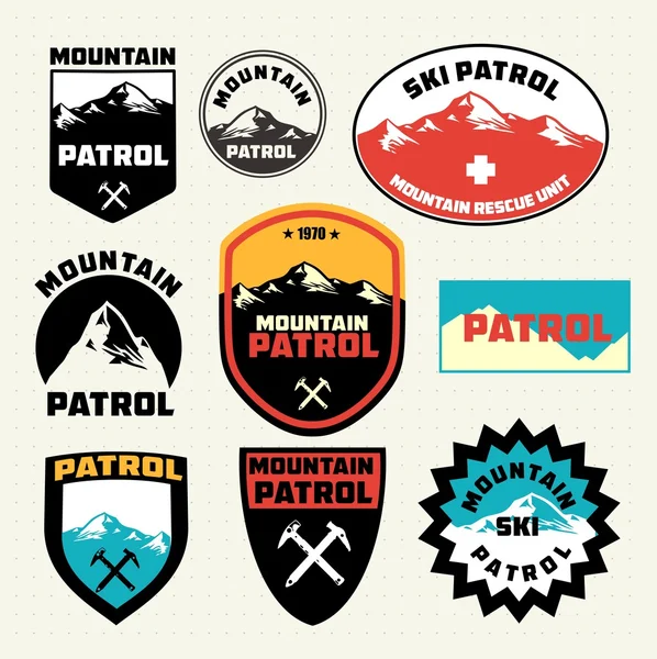 Ensemble d'insignes de montagne pour la patrouille de ski — Image vectorielle