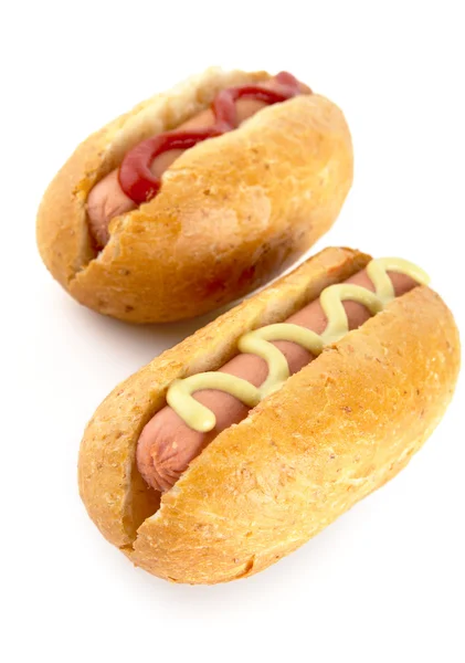 Hotdog con senape e ketchup isolati su bianco dall'alto — Foto Stock