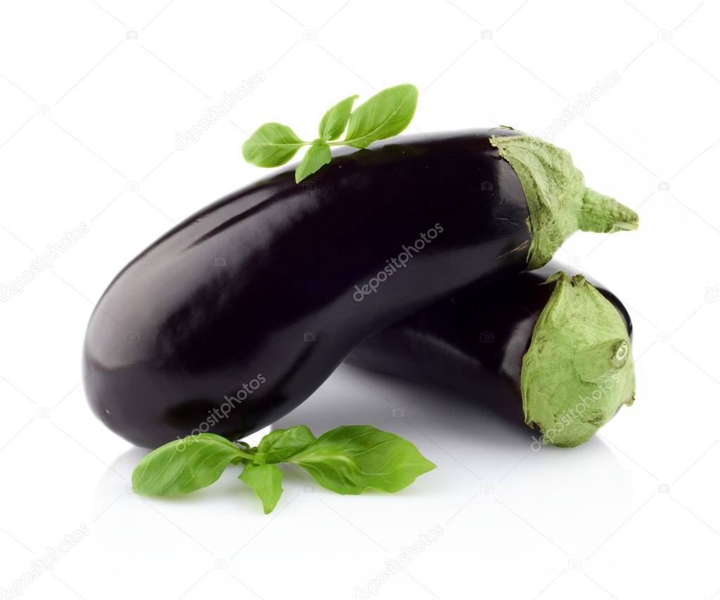 Pair aubergines,eggplants with basil leaves isolated white