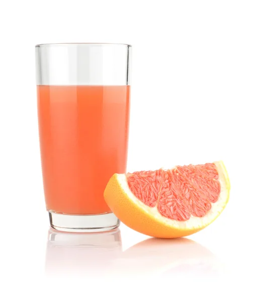 Studio shot of grapefruit juice and quarter isolated on white — Stock Photo, Image