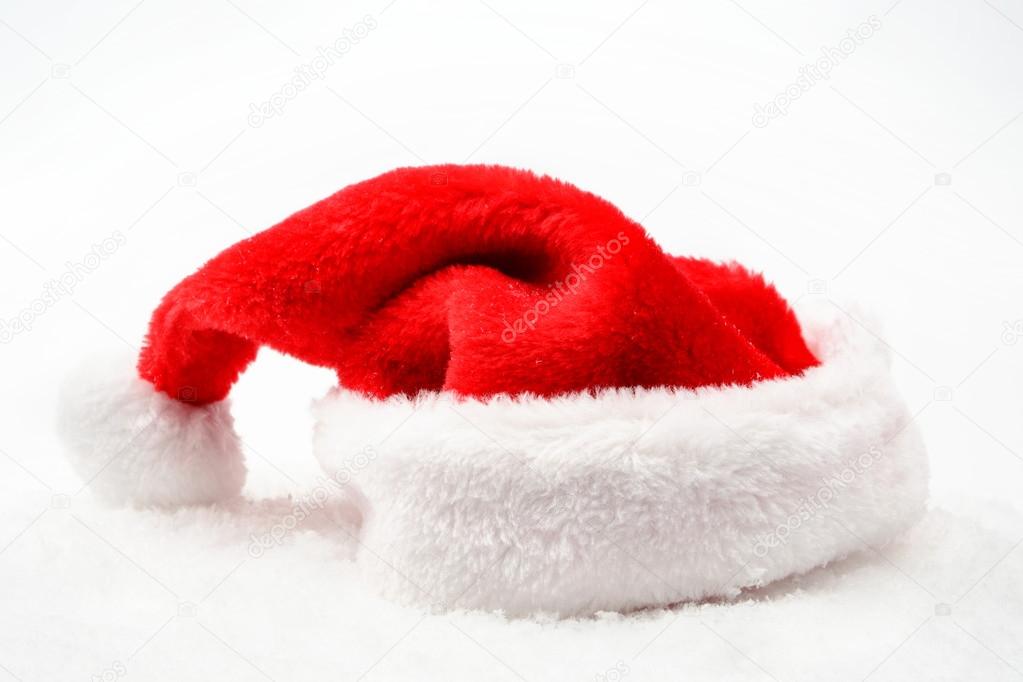 Santa claus christmas red cap with white collar on snow