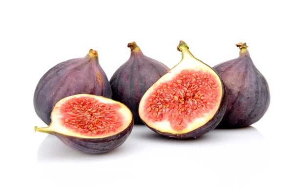 Group sliced figs isolated on white background — Stock Photo, Image