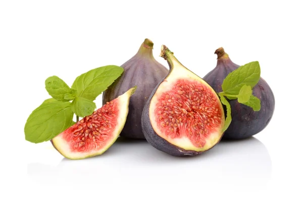 Four sliced figs isolated with mint on white background — Stock Photo, Image