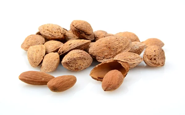 Group of almonds with shell isolated on white — Stock Photo, Image