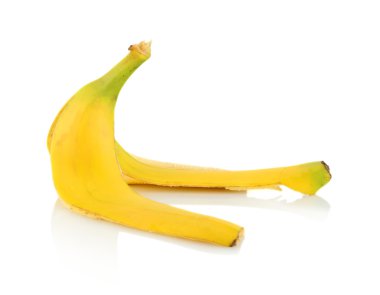 Peel of banana on isolated on white  clipart