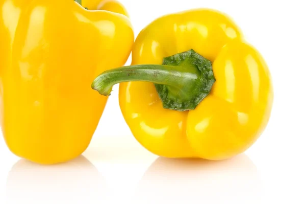 Cropped shot of two yellow bell peppers isolated on white — Stock Photo, Image