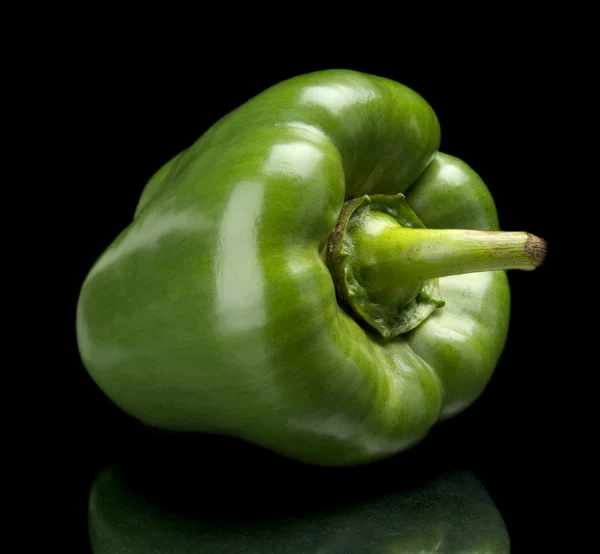 Studio shot of green bell pepper isolated black background — Stock Photo, Image