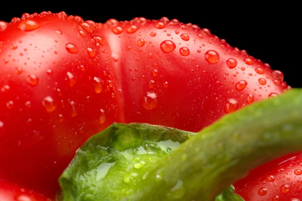 Macro cut shot of red bell pepper background with water drops — Stock Photo, Image