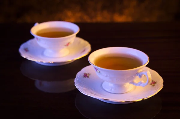 Imagen de estilo antiguo con dos tazas de té — Foto de Stock