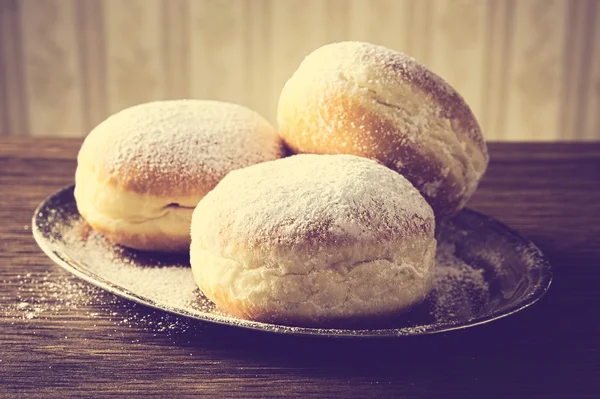 Nahaufnahme Bild Donuts auf Tablett in alten Stil Tapete lizenzfreie Stockfotos