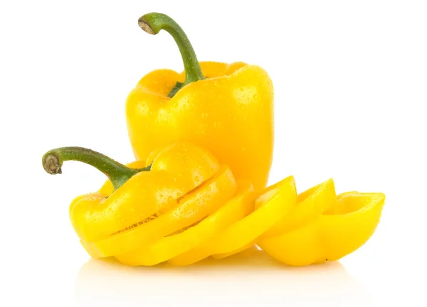 Closeup slices of yellow bell peppers on white with drops of water — Stock Photo, Image