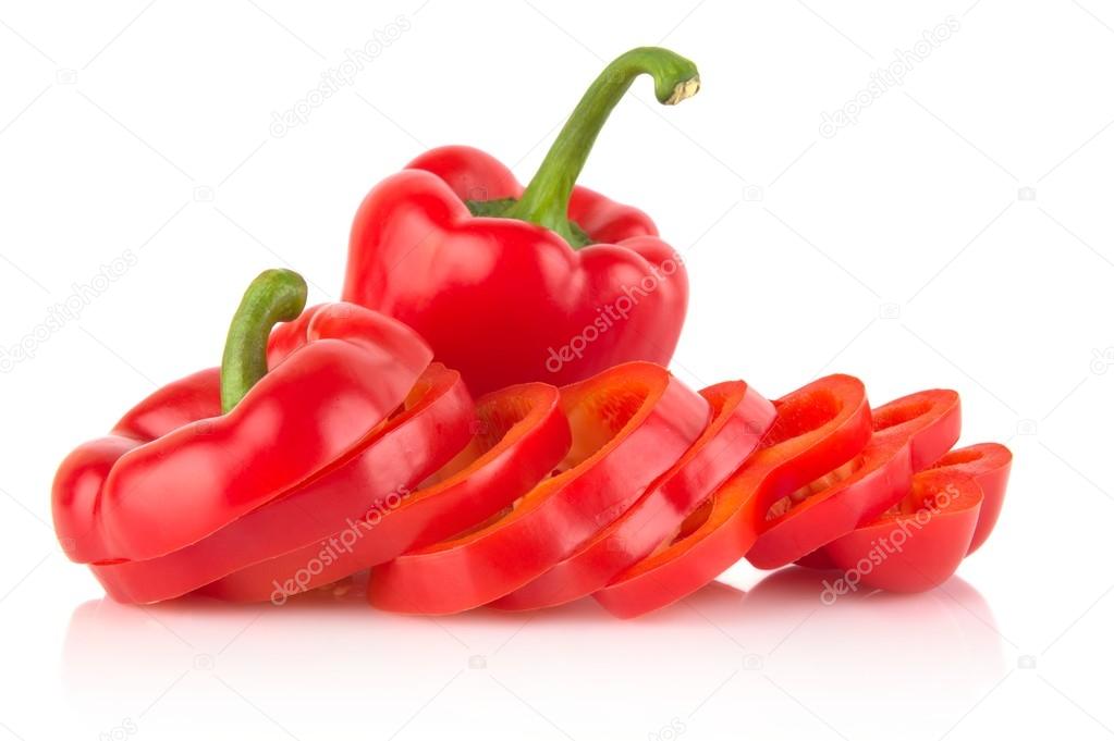 Closeup slices of red bell peppers isolated on white