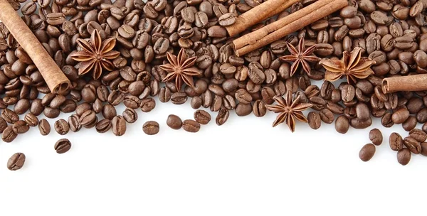 Coffee beans at the top with anise and cinnamon on white — Stock Photo, Image