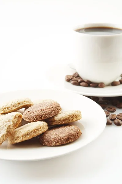 Cup of coffee with cookies and saucer on white — Stock Photo, Image