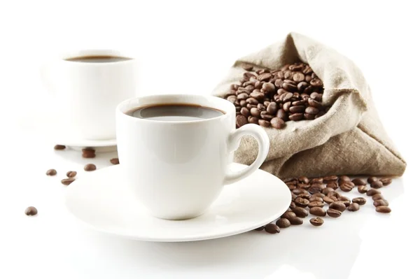 Cups of coffee with saucer with bag with coffee beans on white — Stock Photo, Image