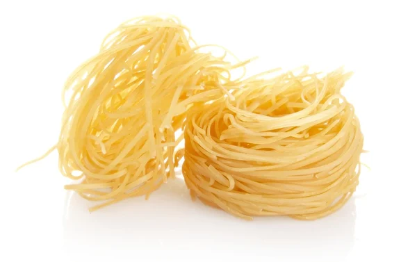 Closeup shot of tagliatelle isolated on white — Stock Photo, Image