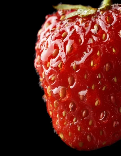 Crooped macro view strawberry isolated on black background — Stock Photo, Image