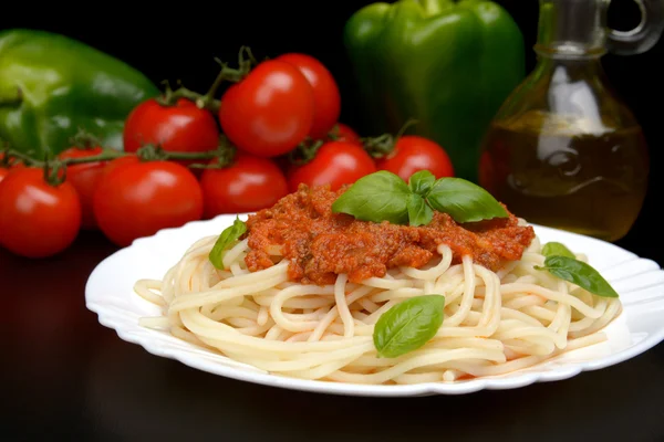 Cropped pasta spaghetti bolognese sauce on black — Stock Photo, Image