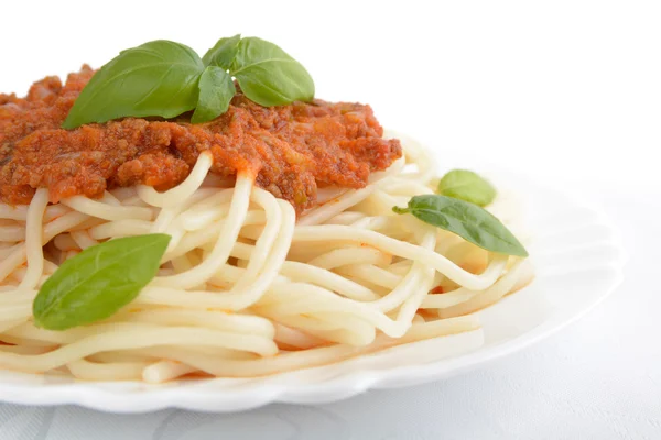 Close up pasta with bolognese sauce on white,cropped shot — Stock Photo, Image