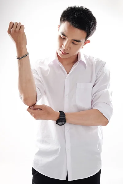 Aziatisch mens shirt met rugnummer dragen op witte achtergrond — Stockfoto