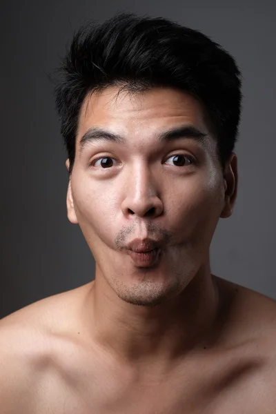 Asian man portrait with no makeup show his real skin in grey background - soft focus — Stock Photo, Image