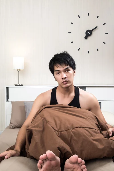 Asian man just woke up in the morning