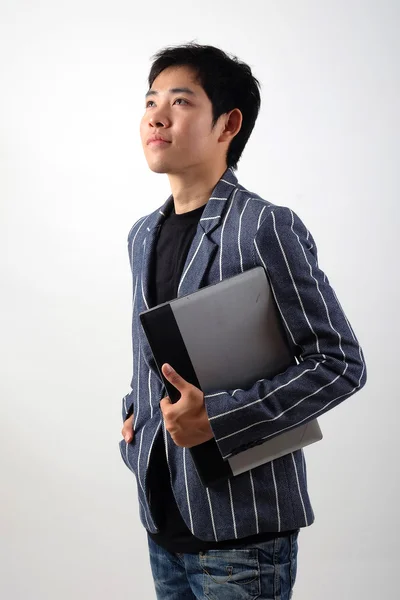 Asian businessman with laptop — Stock Photo, Image