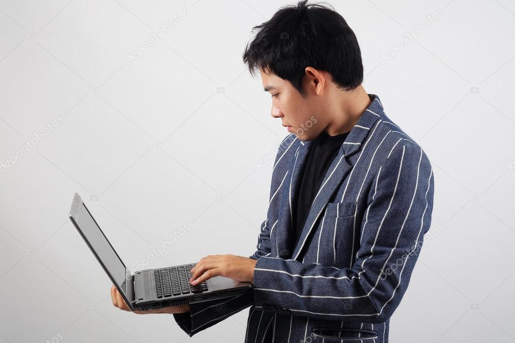 Asian businessman with laptop
