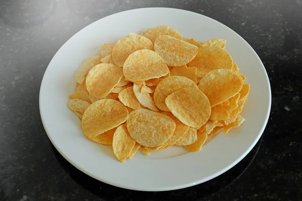 Batatas fritas no prato — Fotografia de Stock