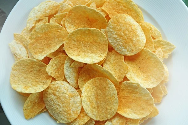 Patatas fritas en el plato —  Fotos de Stock