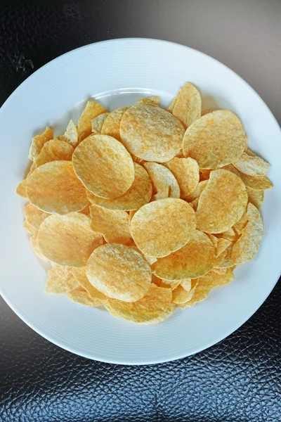 Potato chips in the dish — Stock Photo, Image