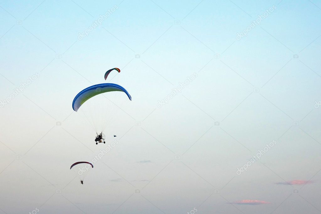 Paramotor in the blue sky