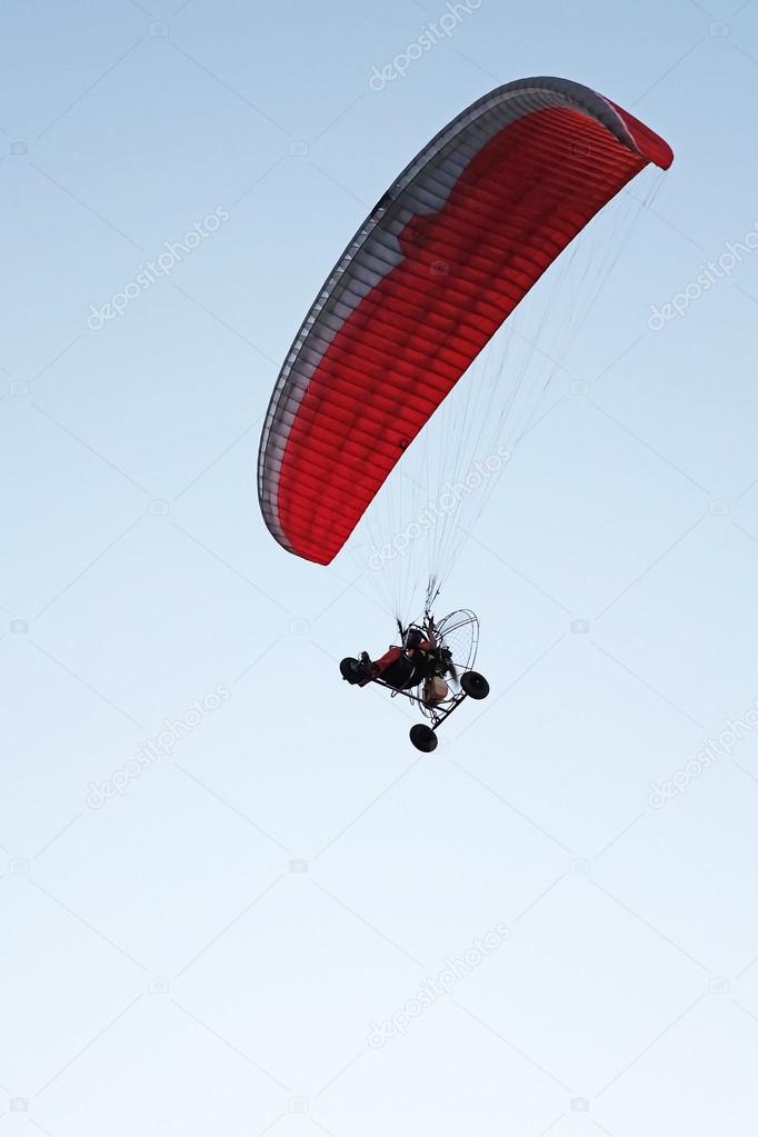 Paramotor in the blue sky