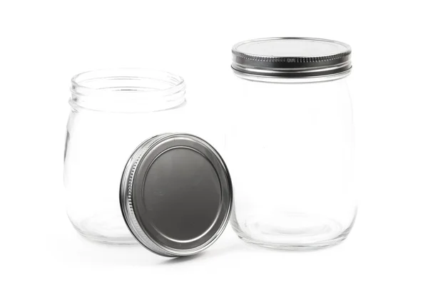 Empty glass canister in white background — Stock Photo, Image