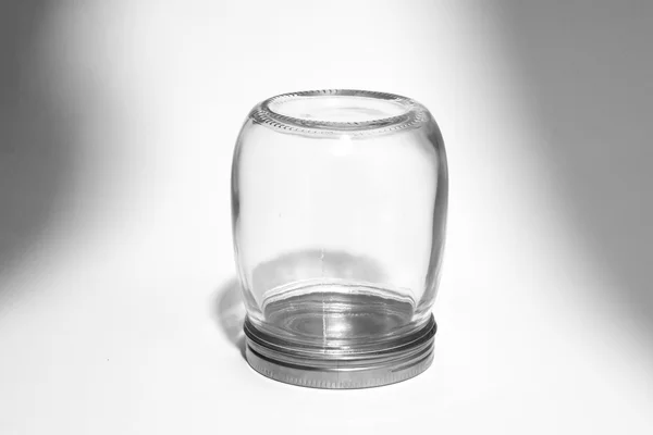 Pustej szklanki kanister w tle — Zdjęcie stockowe