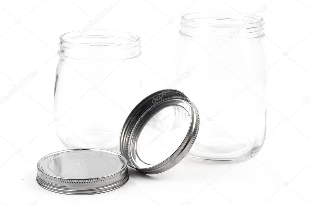 Empty glass canister in white background