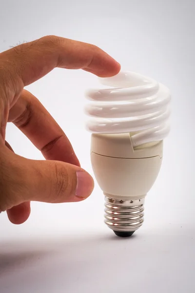 Twist light bulb on white background — Stock Photo, Image