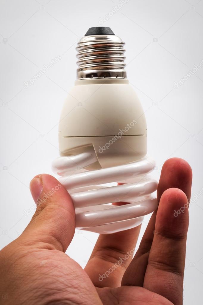 twist light bulb on white background