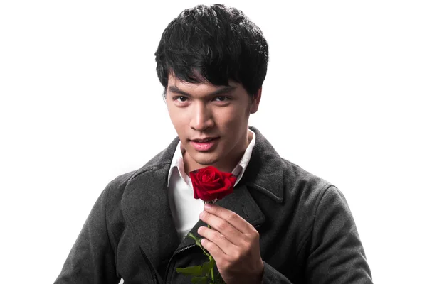 Asian handsome man hold the red rose with love in white background — Stock Photo, Image