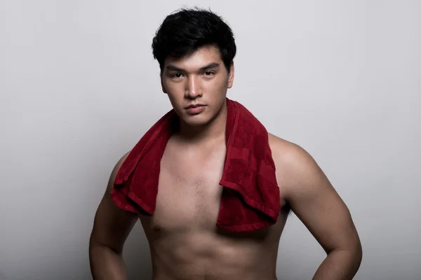 Asian man with towel in the hand — Stock Photo, Image