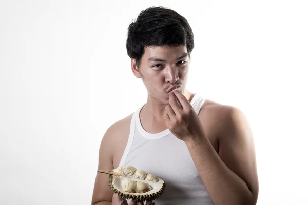 Asian man eating Durian — Stock Photo, Image