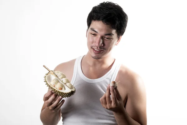 Asian man eating Durian — Stock Photo, Image