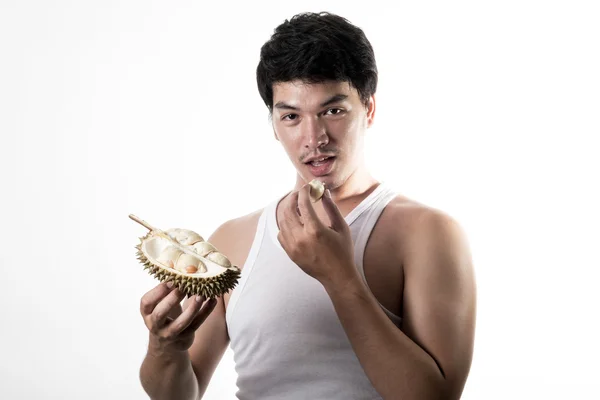 Asian man eating Durian — Stock Photo, Image