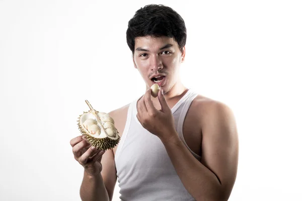 Asian man eating Durian — Stock Photo, Image