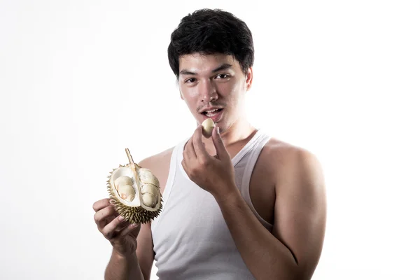 Asian man eating Durian — Stock Photo, Image