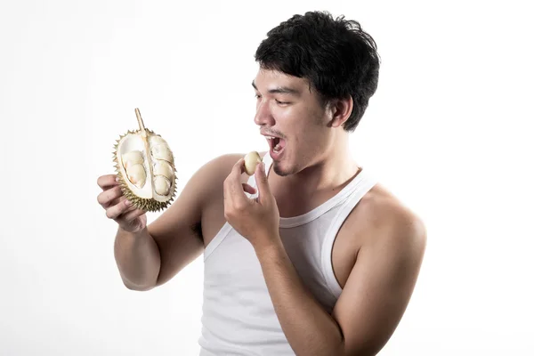 Asian man eating Durian — Stock Photo, Image