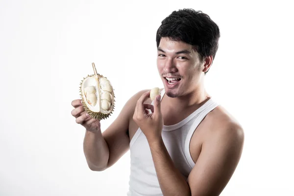 Asian man eating Durian — Stock Photo, Image